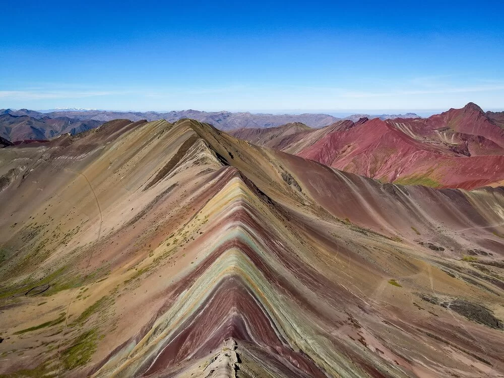 An image of a rainbow colour mountain called Vinicuna in peru