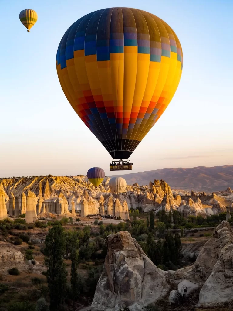 Hot Air Balloons in the sky during sunrise in Cappadocia