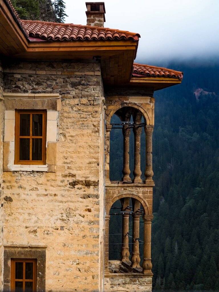 An old monastery building with windows and balconies