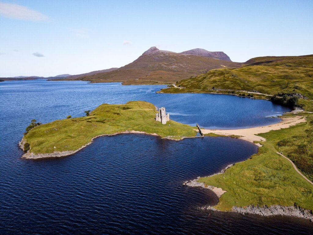 Aerial view of Ardvreck Castle in Scotland