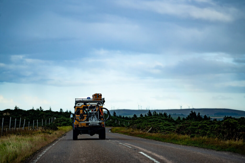 Yellow car driving on the road