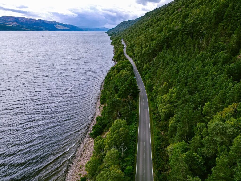 Aerial view of a road alongside Loch Ness in Scotland