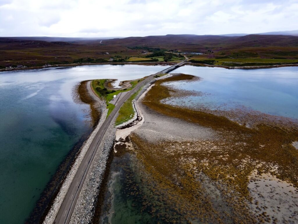 Road crossing a loch in Scotland