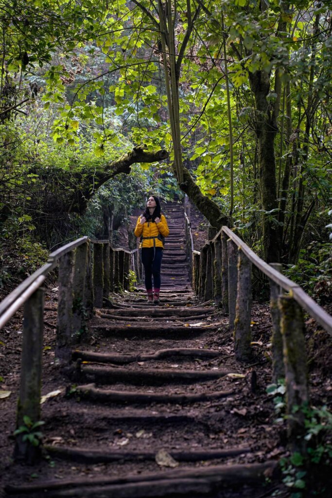 Hiker is walking down a steep staircase