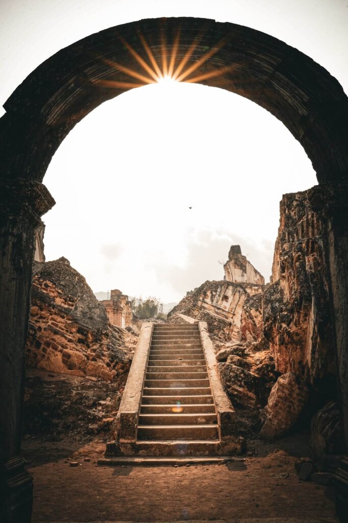 Stairs under an arch in a church ruin in Antigua