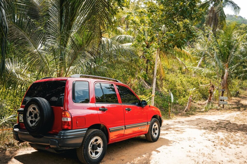 Red 4x4 parked in Belize