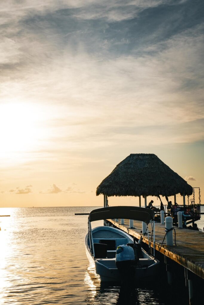 A boat at a pier during sunset in San Pedro in Belize