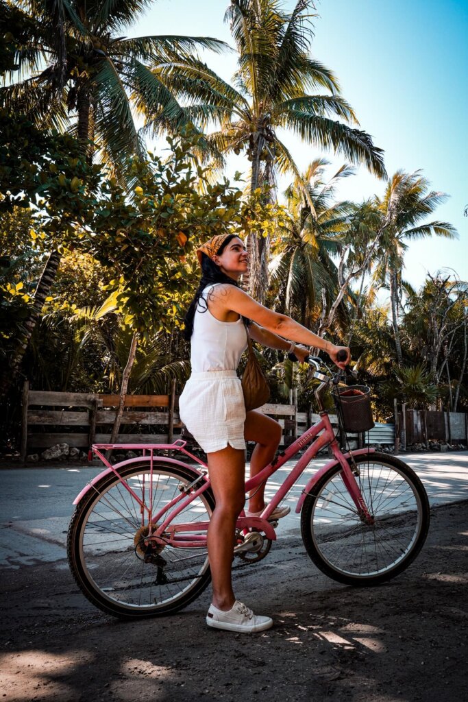 Girl on a bike in Tulum Mexico