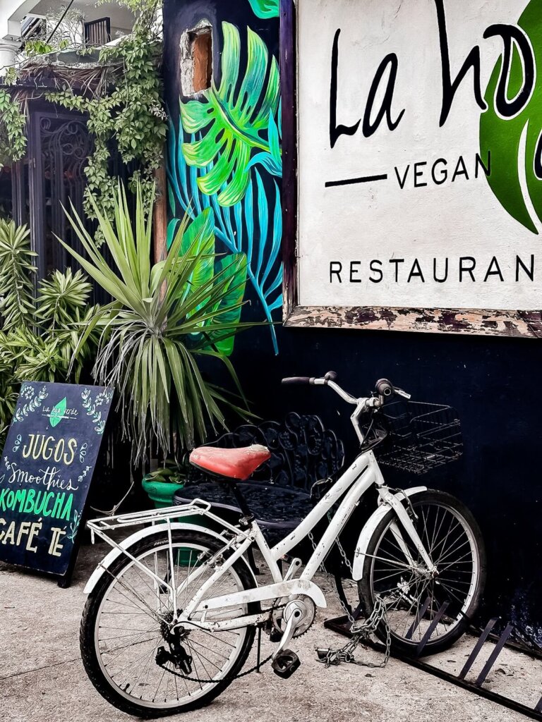 Bike in front of a restaurant in Tulum