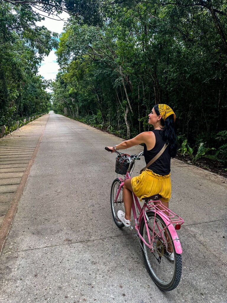 Girl on a bike in Tulum Mexico