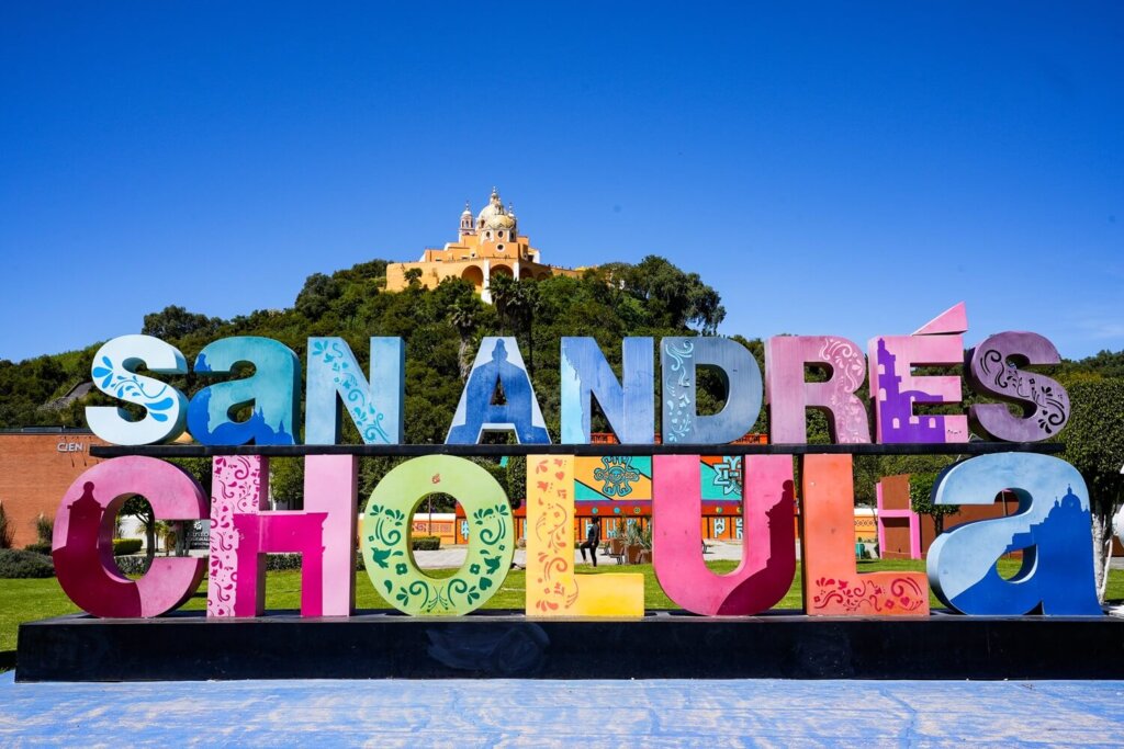 Giant San Andres Cholula Letters in front of a yellow church